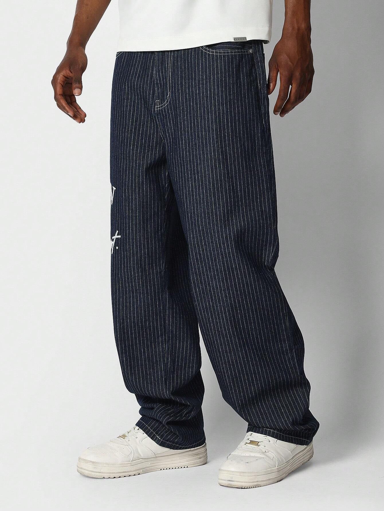 Calça Denim reta com bordado