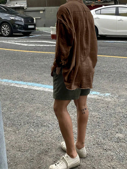 Camisa Casual Soltinha e Folgada de Manga Longa com Bolso e Abotoamento