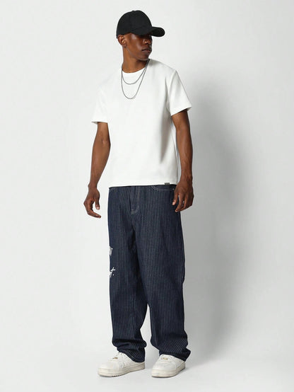 Calça Denim reta com bordado