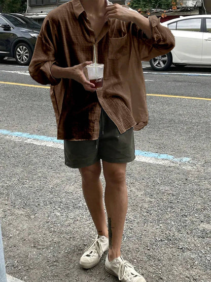 Camisa Casual Soltinha e Folgada de Manga Longa com Bolso e Abotoamento