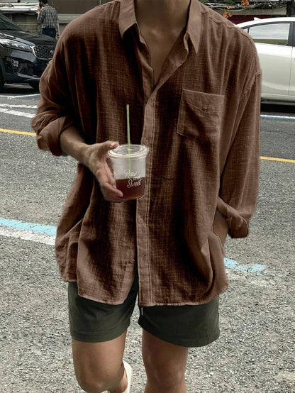 Camisa Casual Soltinha e Folgada de Manga Longa com Bolso e Abotoamento