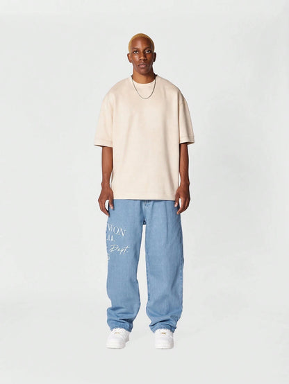 Calça Denim reta com bordado