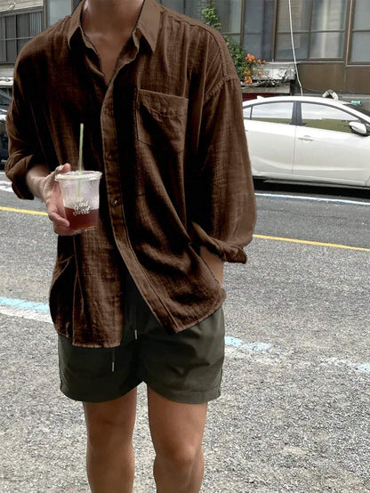 Camisa Casual Soltinha e Folgada de Manga Longa com Bolso e Abotoamento